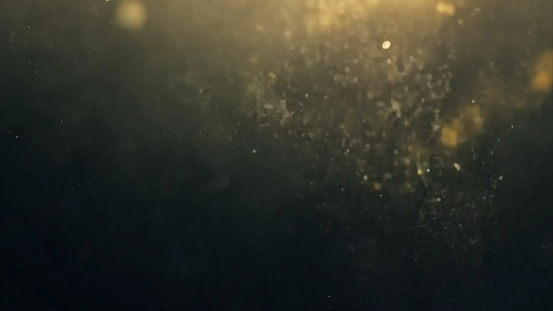 Golden Dust Particles Overlay for Luxury Product Launch Videos